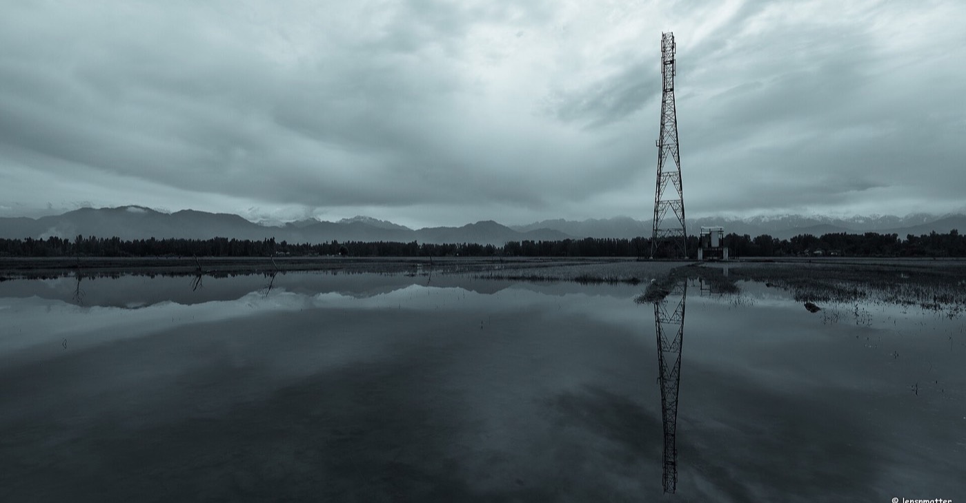 Flooded fields under monsoon cloud